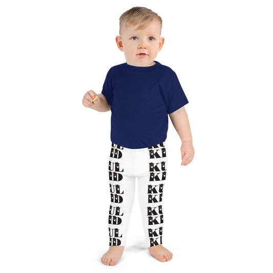 Barn iført KUL KID Spooky-Stripe leggings i helfigur