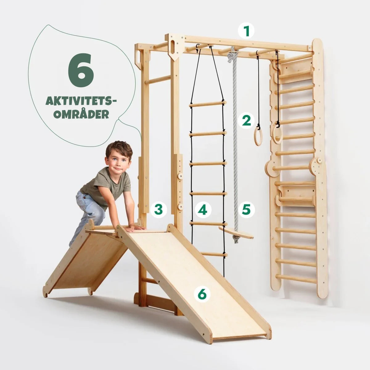 Barn henger i armgang på jungelpark – innendørs klatring og styrke fra 2 år